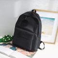 Fashion polyester customize Logo trend high school bag simple color travel backpacks pendant bags